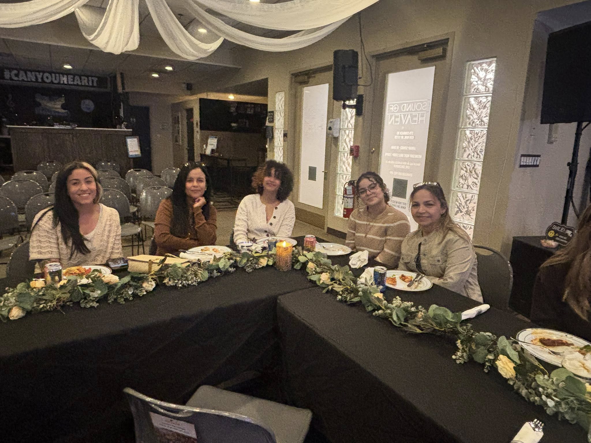 Open Bibles and conversation at Women Of Virtue